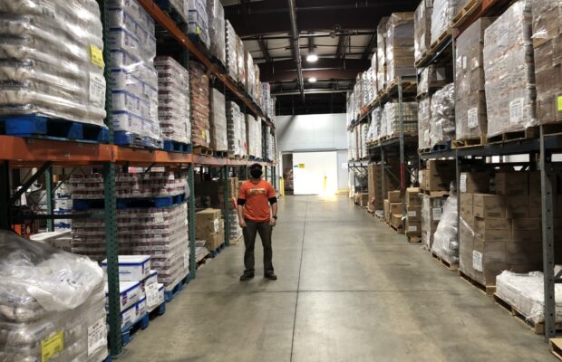 The Man Moving The Food at The Food Bank